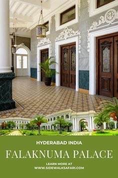 the interior of a large building with columns and doors in front of it is tiled flooring