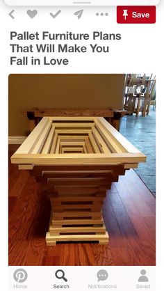 a wooden table sitting on top of a hard wood floor