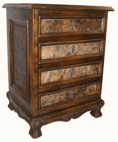 an old wooden dresser with carvings on the top and bottom drawers, against a white background