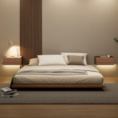 a bedroom with a bed, nightstands and two lamps on the side of it