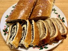 a white plate topped with lots of different types of bread