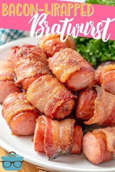 bacon wrapped bratwurst on a white plate