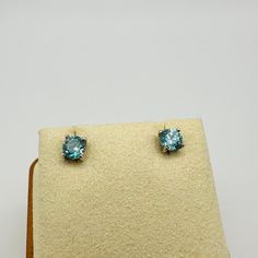 Sterling Silver Round Cut Blue Zircon Stud Earrings 4.5 mm Classic round cut blue zircon studs, beautifully faceted, medium saturated swimming pool color stones, reflect the light amazingly well Diameter measurement: 4.5 mm, around 0.5 carats each 1 carat total Four-prong set in sterling silver Regular pushbacks In excellent condition, will include a pouch and jewelry box Sapphire Blue Topaz Round Earrings, Blue Topaz Blue Earrings, Blue Round Topaz Earrings, Classic Round Blue Topaz Earrings, Blue Topaz Earrings With Brilliant Cut As A Gift, Blue Topaz Round Earrings, Blue Diamond Cut Round Earrings, Pool Colors, Color Stones