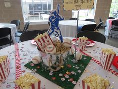 a baseball themed party with popcorn and snacks