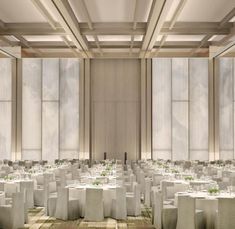 an empty banquet hall with tables and chairs