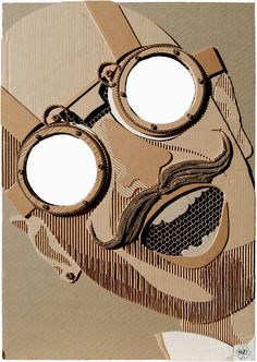 a cardboard mask with two holes in the middle