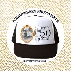 an anniversary photo hat with the words cheers to 50 years on it and gold dots in the background