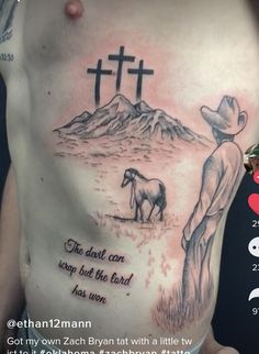 a man with a cowboy hat and cross tattoo on his chest