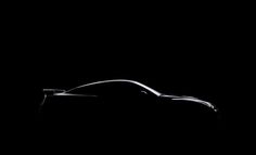 a car is shown in the dark with its hood up