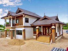 the house is made of wood and has two levels on each level, with stairs leading up to the second floor