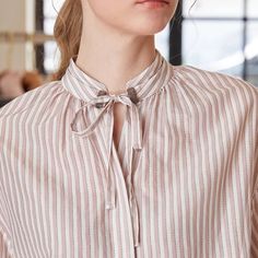 Elevate Your Wardrobe with Luxury and Style Indulge in the epitome of luxury and elegance with our high-quality striped blouse, perfect for the sophisticated woman. This autumn blouse, crafted from a premium blend of 70% cotton and 30% silk, offers a harmonious balance of comfort and style. Whether you're heading to the office or enjoying a casual day out, this blouse will effortlessly enhance your ensemble. Basic Features Our Luxury Striped Cotton-Silk Long Sleeve Blouse features a timeless str Silk Long Sleeve Blouse, Hip Bone, Striped Linen Shirt, Fall Blouse, Ribbon Shirt, Cardigan Sweater Vest, Band Shirt, Striped Long Sleeve Shirt, Striped Fabric