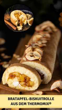 the bread is cut in half and ready to be eaten with other food items around it