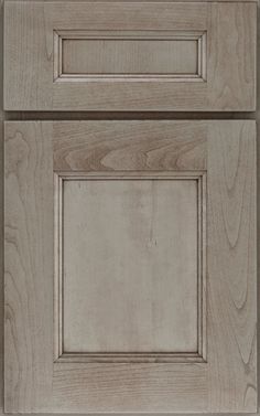 a close up view of the front and side of a cabinet door with wood grained finish