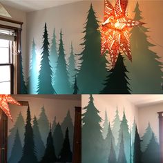 three pictures of pine trees painted on the wall and one has a star hanging from it