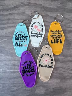 six different colored tags with words on them