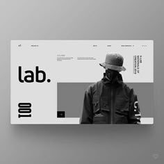 a person wearing a hat and jacket is standing in front of a web page with the word lab on it