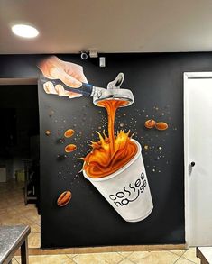 a painting of coffee being poured into a cup with orange liquid coming out of it