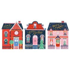 three small houses with christmas decorations on the front and side, each painted in different colors