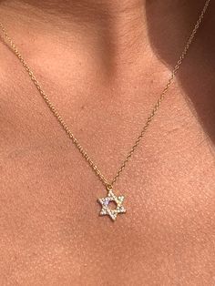 "Sterling Silver CZ Star of David Necklace Chain Length: 16\" with a 2\" Extension Clasp: Spring Ring Finish: 18kt Gold Plating Product Care: To properly care for your new MaLi Beads please remember to: Apply beauty products such as perfume, hairspray or deodorant before wearing your jewelry as certain chemicals in these products may damage the finish. Always remove your jewelry before swimming, doing household chores or using abrasive cleaners." Star Of David Jewelry, Gold Star Of David Necklace, Jewish Star Necklace, Jewish Necklace, David Star, Star Of David Necklace, Threader Earrings Gold, Jewish Star, Bat Mitzvah Gifts