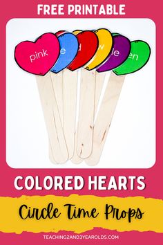 colored hearts on wooden sticks with the text free printable for valentine's day