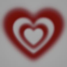 a red and white heart shaped object on a gray background with some blurry lines