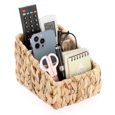 a basket filled with assorted items on top of a white surface