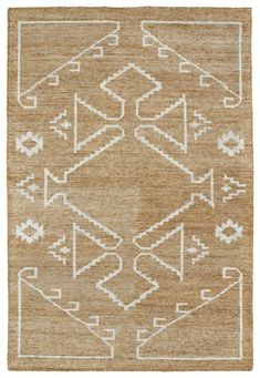 a brown rug with white designs on it