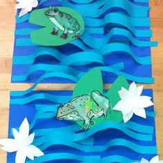 paper cut outs with fish and flowers on them