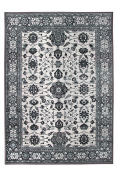 a black and white rug with an intricate design