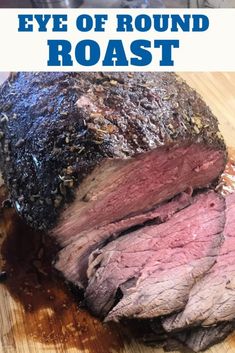 a close up of a roast beef on a cutting board with the words eye of round roast