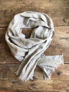 "This is a lovely light linen scarf made from 100% pure linen. The color is between light grey and brown - known also as taupe. It is the color of natural, un-dyed linen. A very nice tone that will match beautifully other earthy and grounded colors in your outfit. Edges are frayed for more casual look and fixed to prevent further fraying. Dimensions: approximately 19\" x 81.8\" [50 x 208 cm] Care instructions: - gentle wash cycle - preferably lukewarm water - straighten and hang to dry - It will Brown Scarf, Simple Scarf, Linen Scarf, Brown Scarves, Linen Scarves, Dyed Linen, Look Plus, Linen Clothes, Linen Women