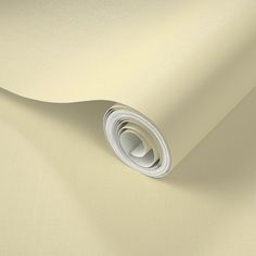 an image of a beige wallpaper with a white circle on the top and bottom