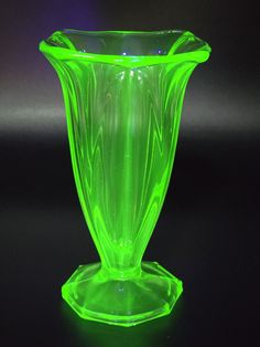 Up for sale Antique Art Deco Uranium/Vaseline Green Glass Vase by Henry Greener/England circa 1900-1920.  A very rare Art Deco style with beautiful geometric forms throughout the exterior and base. A unique lime green color, glowing green very bright in ultraviolet light. Purchased from a private collection in Chester/UK. This item has been used before and may show some signs of cosmetic wear, but is in excellent condition with no chips or cracks. See the dimensions and condition from the photos, they are an integral part of the description. You get what you see in the pictures.   Please look at the photos carefully and contact me if you have any questions. Collectors, don't miss this opportunity to purchase an  Art Deco Uranium/Vaseline Lime Green Glass Vase by Henry Greener circa 1900-19 Vaseline Glass Antiques, Henry Green, Chester Uk, Glass Antiques, Indoor Ideas, Green Glass Vase, Vaseline Glass, Ultraviolet Light, Crystal Glassware