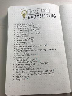 an open notebook with writing on it and the words ideas for babysitting written in blue