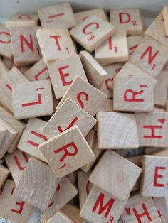 wooden scrabbles with letters spelling out the word'content'in red ink