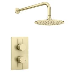 an overhead shower head with thermostaer and hand showerhead in brushed brass