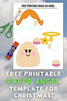 the printable paper angel template for christmas is shown with scissors and other crafting supplies