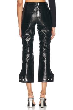 Self: 88% cotton 10% polyurethane 2% elastane, Lining: 100% cupro.  Made in Serbia.  Spot clean only.  Zip fly with button closure.  5-pocket styling.  Cut-out detail at bottom with button closure.  Faux patent leather fabric.  .  .  .  .  .  .  .  .  . Vinyl Pant, Patent Leather Pants, Leather Fabric, Serbia, Black Pants, Patent Leather, Leather Pants, Cut Out, Top Brands