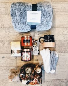 an assortment of items laid out on a wooden floor