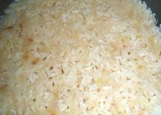 rice is being cooked in a pan on the stove