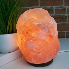 Pink Himalayan Salt Lamp on Wooden Base - 8 tall with bulb and cord Pink Himalayan Salt Lamp, Salt Mine, Himalayan Mountains, Orange Glow, Handmade Gemstone Jewelry, Himalayan Salt Lamp, Salt Lamp, Reddish Orange, Himalayan Pink Salt