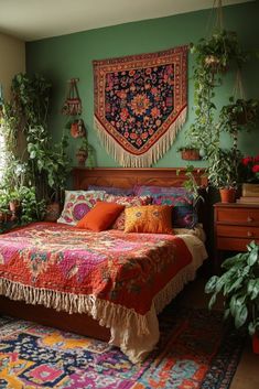 a bed sitting in a bedroom next to potted plants