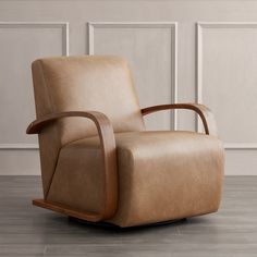 a brown recliner chair sitting on top of a hard wood floor next to a white wall