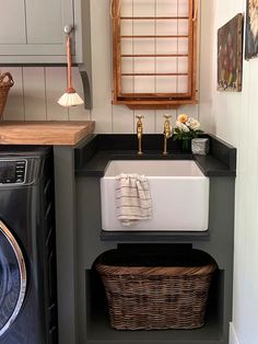 a washer and dryer in a small room