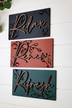 three metal signs on the wall that say relax, relax and refresh with flowers