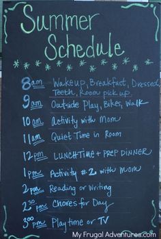 a chalkboard sign advertising the summer schedule