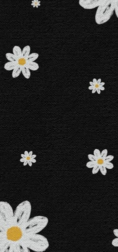 white daisies on black fabric with yellow centers