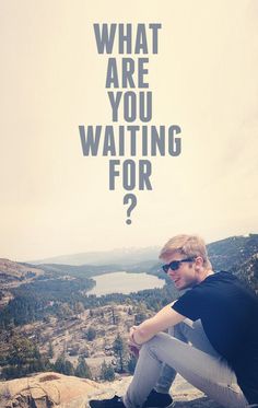 a man sitting on top of a rock with the words what are you waiting for?