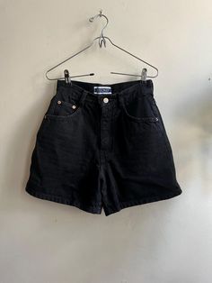 7/8 [W: 12in, H: 18in, ins: 4.5in, L: 14.5in] | 1990s high waist black denim shorts by Nuovo. 100% cotton. No flaws *All measurements taken flat High Waist Black Denim Shorts, Short Jean, Flaws And All, Denim Short, Short En Jean, Black Denim Shorts, Short Outfits, Black Denim, Jean Shorts