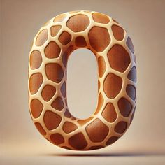 the letter o is made up of giraffe print material and has an unusual shape